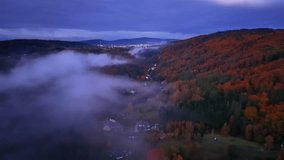 nighttime fog over illuminated village, serene twilight mist envelops illuminated village - Powered by Shutterstock - Get 15% off with code: PIKWIZARD15