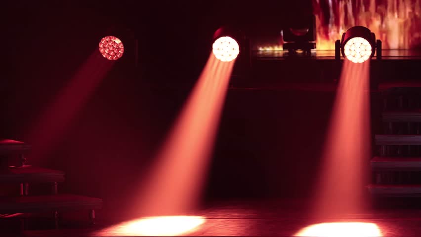 stage light with colored spotlights and smoke before the performance