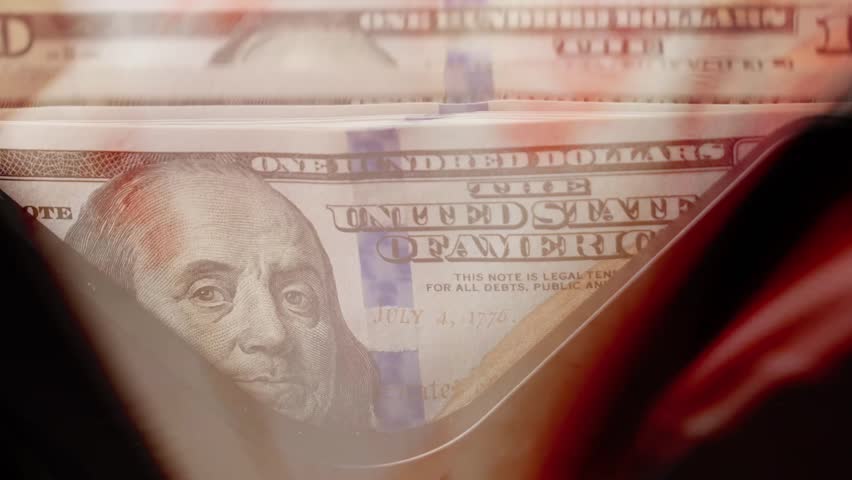 Double-exposure video of US dollar and Russian ruble banknotes in a counting machine, symbolizing global finance, currency exchange, economic power, and international money flow - Powered by Shutterstock - Get 15% off with code: PIKWIZARD15