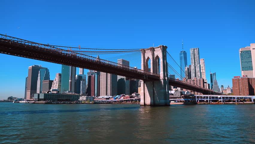 Brooklyn Bridge with Downtown Manhattan. Iconic Brooklyn Bridge spanning the East River with the Manhattan skyline in the background.