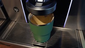 Coffee making process, Automated coffee brewing scene featuring barista preparing takeaway drink - Powered by Shutterstock - Get 15% off with code: PIKWIZARD15