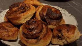 Closeup of cinnamon bun, Golden glazed cinnamon roll macro, Detailed shot of moist cinnamon roll - Powered by Shutterstock - Get 15% off with code: PIKWIZARD15