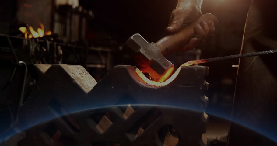 Hammer dropping, worker striking hot U shape metal, shaping inner curve as blue overlay appears. Forging, steel, workshop, sparks, holographic, digital, craftsmanship