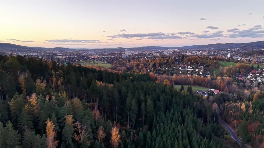 Evening tranquility with illuminating suburban scenery, Calm dusk in town near lush forest with gentle lighting