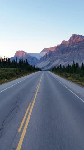 Driving Through Scenic Banff National Park with Majestic Mountains and a Glimpse of the Icefields Parkway