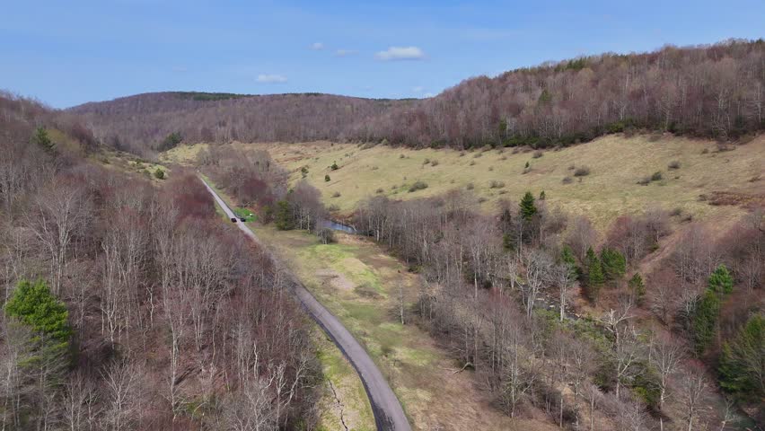 Road Through Scenic Canaan Valley Surrounded by Hills in West Virginia Spring