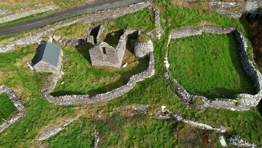 Ireland Epic Locations walls and remains of ancient farm Slea Head Dingle Kerry on a bright autumn morning