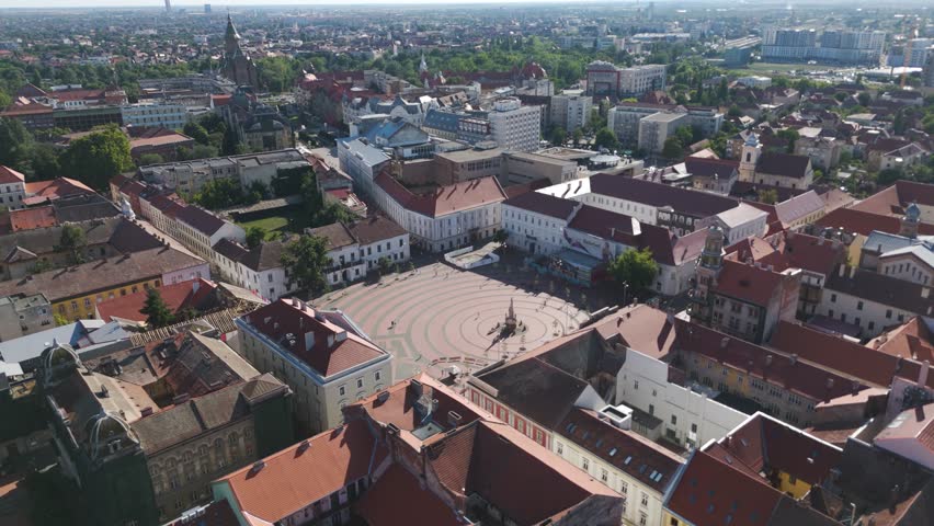 Drone view of Liberty Square highlighting its vivid architecture, cultural atmosphere, and the heart of Timișoara’s historic district.
