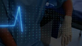 Nurse wearing scrubs and mask monitoring patient data in hospital, with neon-blue ECG overlay. Medical, healthcare, clinical, diagnostic, technology, professional, hospital - Powered by Shutterstock - Get 15% off with code: PIKWIZARD15