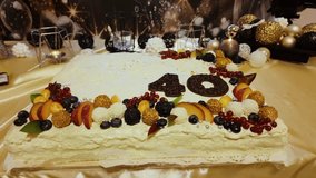 Elegant 40th birthday cake with fruits chocolate and gold decorations - Powered by Shutterstock - Get 15% off with code: PIKWIZARD15