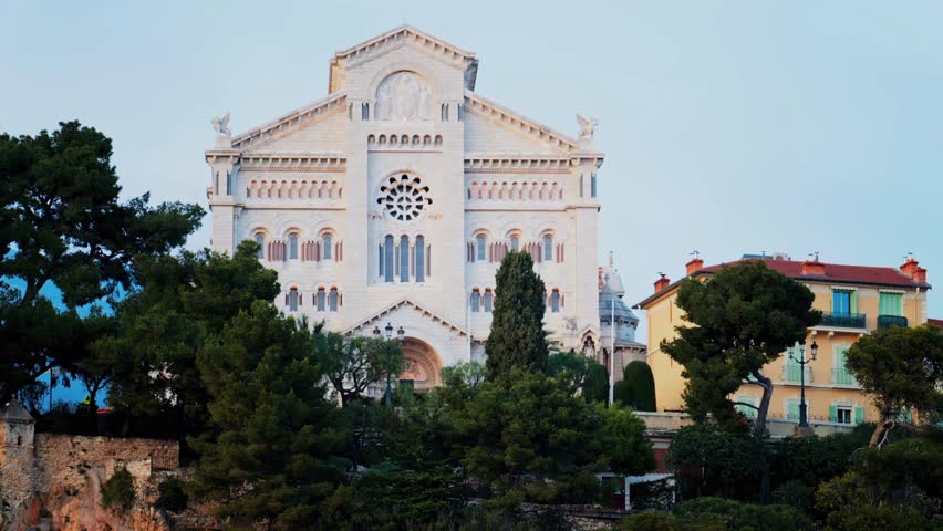Distant view of the Cathedral of Our Immaculate Lady in Monaco, highlighting historic architecture, city skyline, and European landmark charm.