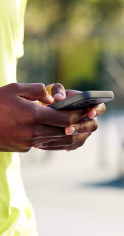 Outdoor, man or hands typing with phone to review weather app, wind speed or bad conditions for sport play. Scroll, strong breeze or athlete check web forecast update, tech or monitor court advantage