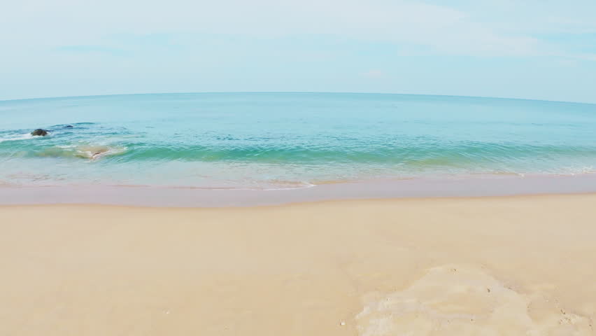 Summer sea background,Blue sky white clouds over ocean waves break on sand beach