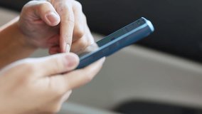 hand holding and using smartphone inside car for navigation gps, showing technology and communication while traveling, close-up - Powered by Shutterstock - Get 15% off with code: PIKWIZARD15