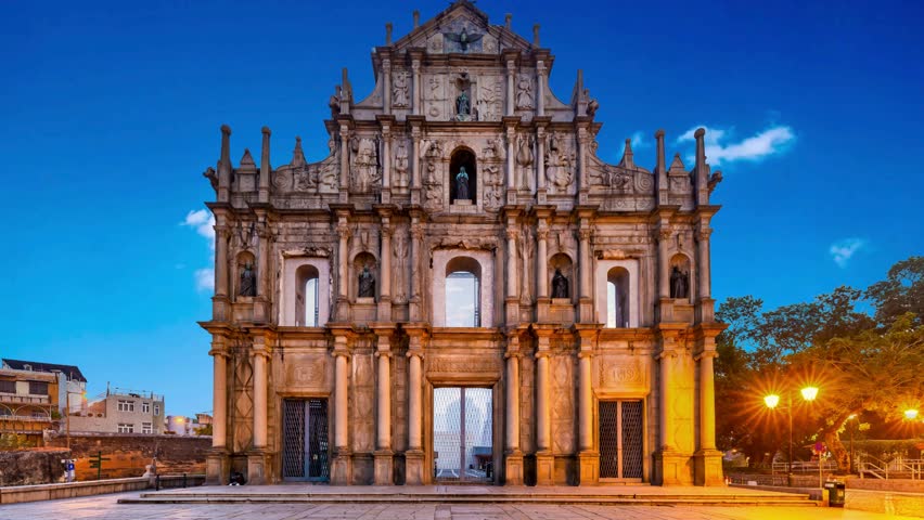 Macau Tourists visit the Ruins of St.Paul's Cathedral at Jesus Company Square in Macau, is a historic architectural landmark, and a UNESCO World Heritage.Ruins of St. Paul in Macau, Macao, China. unes