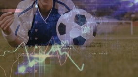 Athlete lifting soccer ball on pitch as camera pulling back, data overlays tracking sports metrics. Player, field, goalposts, grass, outdoor, jersey, analytics - Powered by Shutterstock - Get 15% off with code: PIKWIZARD15