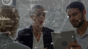 Woman tapping tablet man rotating it in business reviewing data with network charts over screen. Collaboration, teamwork, analytics, dashboard, office, conference, discussion - Powered by Shutterstock - Get 15% off with code: PIKWIZARD15