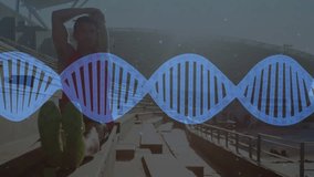 Man sitting steps starting hands-behind stretch rotating torso while DNA overlaying fitness warming. Bleachers, outdoor, stadium, athlete, mobility, energy, focus - Powered by Shutterstock - Get 15% off with code: PIKWIZARD15