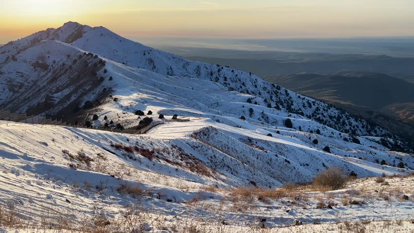 Aerial view of the Rocky Mountains at sunset
