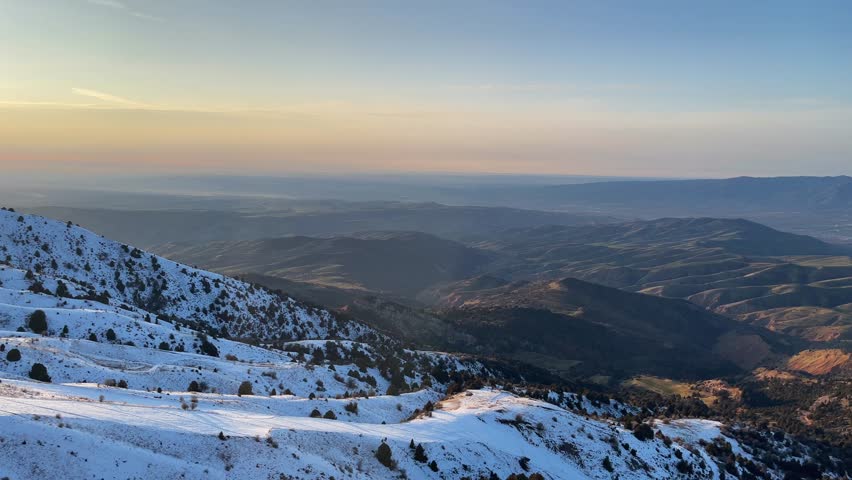 Aerial view of the Rocky Mountains at sunset