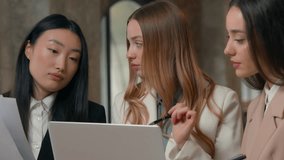 Business ceo leader boss Caucasian woman consulting advising to coworkers multiracial colleagues three multiethnic women team girls females businesswomen talking marketing result data online laptop - Powered by Shutterstock - Get 15% off with code: PIKWIZARD15
