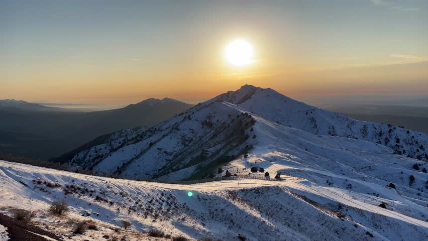 Aerial view of the Rocky Mountains at sunset