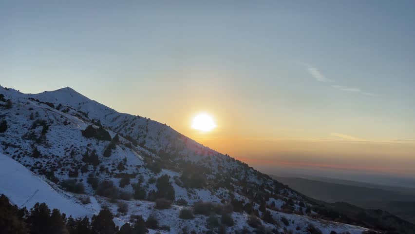 Aerial view of the Rocky Mountains at sunset