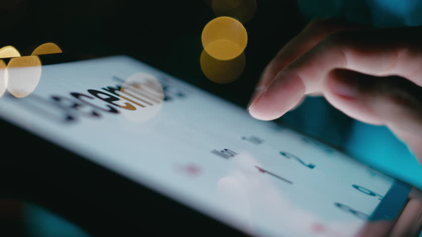 Man Counting Days To Christmas On His Tablet Calendar
