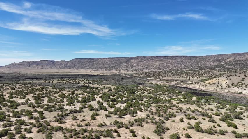Aerial landscape of lava fields and Western cliffs along historic route 66 Anzac New Mexico NM USA