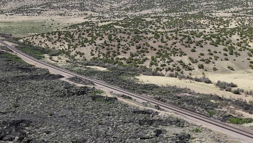 Aerial landscape of lava fields and Western cliffs along historic route 66 Anzac New Mexico NM USA
