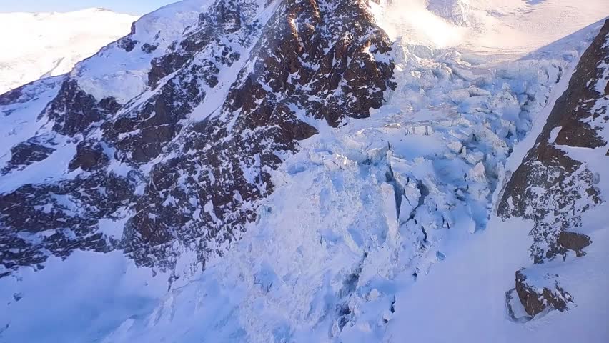 View from the mountain lift cabin of the remains of an avalanche in the Zermatt ski area in Switzerland
