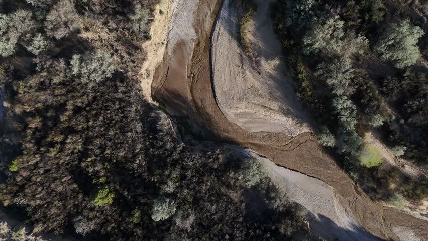 Aerial top down of empty dried up river bed on historic route 66 in Lupton Arizona AZ USA