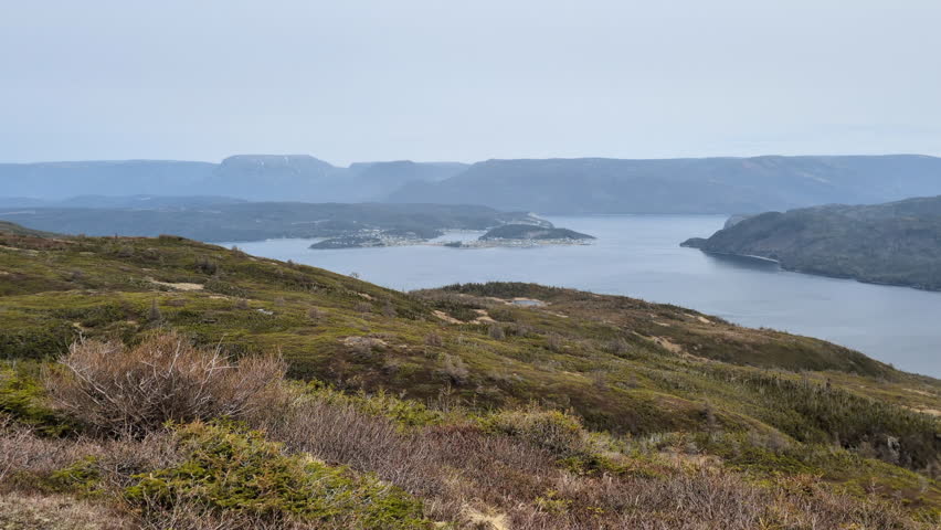The summit of the Lookout Hills Trail with a view on the Bonne Bay fjord and the city of Norris Point, in the Gros Morne National Park (Woody Point, Newfoundland, Canada)