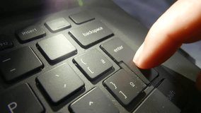 A shaky and immersive POV of someone pressing the Enter Key non-stop. A person typing the Enter Key. Typing on a laptop Keyboard, close-up shot. - Powered by Shutterstock - Get 15% off with code: PIKWIZARD15