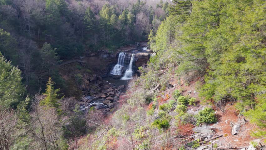 Take in the breathtaking aerial views of Blackwater Falls located in Blackwater Falls State Park. Experience the beauty of nature in West Virginias wilderness.