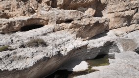Wadi Bani Khalid is a popular tourist destination in Oman, known for its lush oasis, clear turquoise pools, and rugged mountain scenery.
 - Powered by Shutterstock - Get 15% off with code: PIKWIZARD15