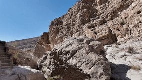 Wadi Bani Khalid is a popular tourist destination in Oman, known for its lush oasis, clear turquoise pools, and rugged mountain scenery.
 - Powered by Shutterstock - Get 15% off with code: PIKWIZARD15