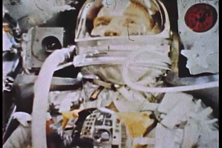 1960s - John Glenn is in orbit with the Mercury Project and looks down on earth from above.