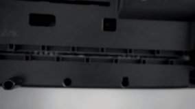 Paper Shredder in Action Destroying Document into Fine Strips, Capturing Office Equipment, Document Security, and Shredding Process - Powered by Shutterstock - Get 15% off with code: PIKWIZARD15