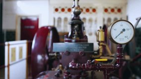 Vintage Victorian-era industrial revolution hydraulic machine with brass fittings, iron castings, and a prominent pressure dial gauge. Highlights historical engineering, mechanical innovation, steampunk aesthetics, and industrial heritage machinery. - Powered by Shutterstock - Get 15% off with code: PIKWIZARD15