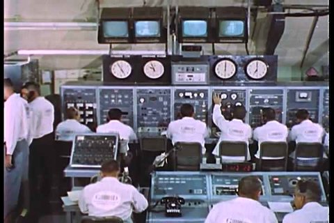 1950s - A long pullback shows mission control at NASA in 1950.
