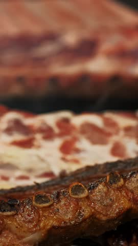 Meat. street food. close-up. grilled meat. Barbecue. fair. food festival. Outdoor cooking. Meat on skewers. Meat on the bone. street market. culinary exhibition or fair.