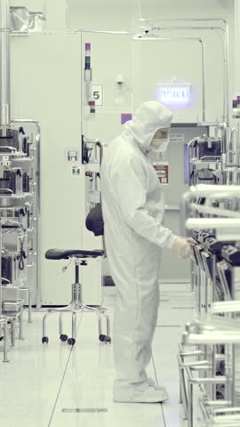 Vertical footage of workers in a Semiconductor manufacturing facility