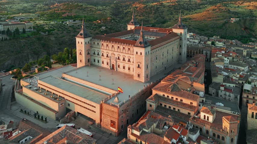 Sunrise view of the historic cityscape of Toledo, Castilla-La Mancha, Spain. Beautiful medieval city with the Alcazar of Toledo, Cathedral de Santa Maria and other historic buildings
