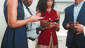 Diverse Business Professionals Engaged with Smartphones in a Modern Office Setting - Powered by Shutterstock - Get 15% off with code: PIKWIZARD15