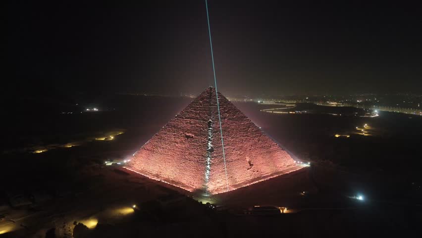 Giza Pyramids with lights during night