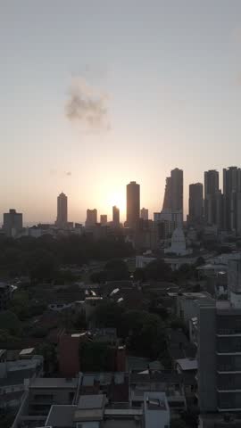 Colombo City Nightscape from Port City Drone Aerial View of Skyline, Harbor Lights, and Coastal Urban Landscape in Sri Lanka