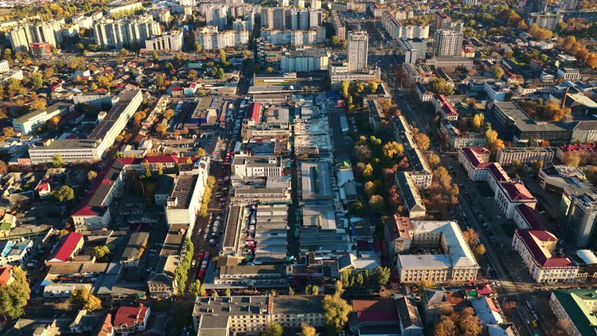 Aerial top view of Central Market and bus station in Chisinau at sunset