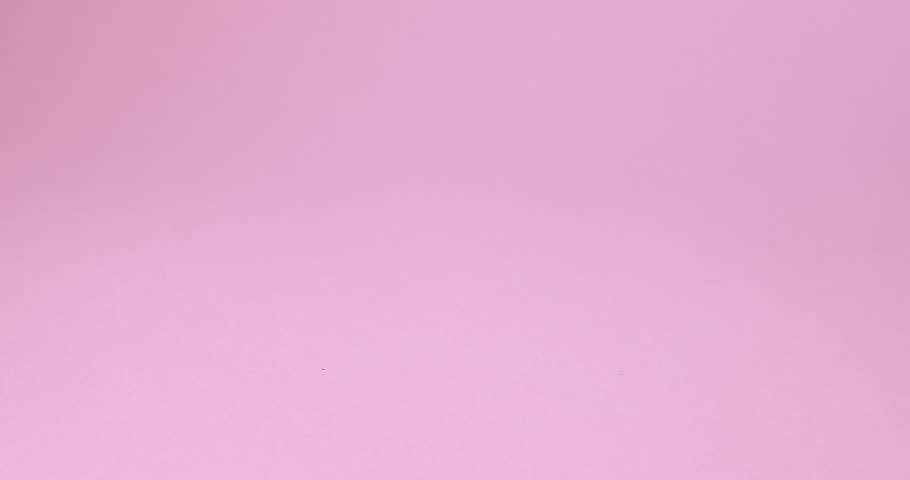 Woman putting pair of stylish kid