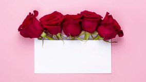  A trendy video banner featuring a red rose flower arrangement with a blank card on a light pink background, perfect for Valentine's Day, International Women's Day, Mother's Day, or wedding invitation - Powered by Shutterstock - Get 15% off with code: PIKWIZARD15